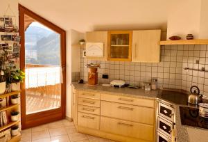 A kitchen or kitchenette at Apartment HaNiLe