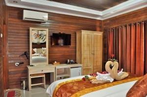 Katil atau katil-katil dalam bilik di Reynten Hill Resort