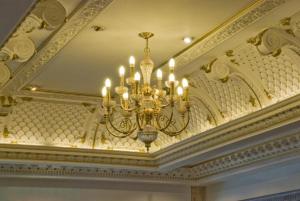 a chandelier hanging from a ceiling in a room at Britannia Hotel Coventry in Coventry