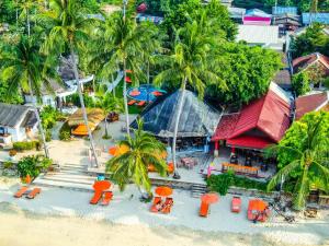 an aerial view of a resort on a beach at Secret Garden Beach Resort in Bangrak Beach