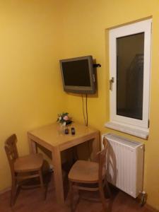 TV a/nebo společenská místnost v ubytování Monterooms Vienna Schönbrunn 10 minutes to downtown