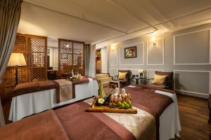 Posezení v ubytování Hong Ngoc Dynastie Boutique Hotel & Spa