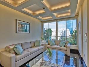 Χώρος καθιστικού στο Sodeco Suites