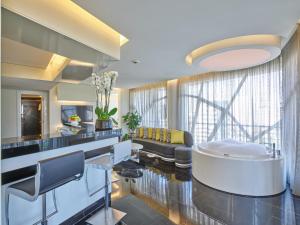 Χώρος καθιστικού στο Sodeco Suites