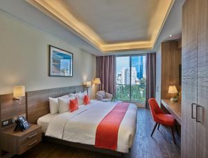 Ένα ή περισσότερα κρεβάτια σε δωμάτιο στο Sodeco Suites