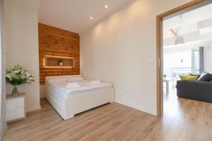 Posteľ alebo postele v izbe v ubytovaní Apartamenty Na Szczycie z balkonem - Dream Apart