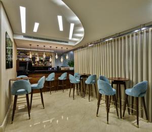 Χώρος καθιστικού στο Sodeco Suites