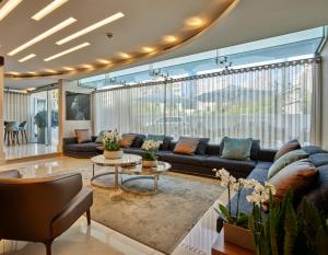 Χώρος καθιστικού στο Sodeco Suites