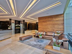 Χώρος καθιστικού στο Sodeco Suites