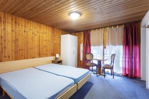 Ein Bett oder Betten in einem Zimmer der Unterkunft BnB Bellefontaine