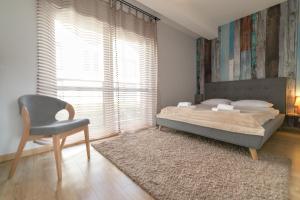 Posteľ alebo postele v izbe v ubytovaní Apartamenty Na Szczycie z balkonem - Dream Apart