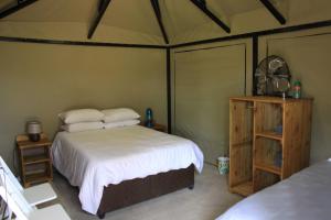 Cama ou camas em um quarto em Casa Cara Resort