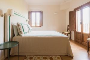 Posteľ alebo postele v izbe v ubytovaní Villa di Campagna Santa Giulia