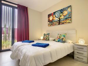 Ένα ή περισσότερα κρεβάτια σε δωμάτιο στο Antilia Terraces Apartment - 1809 +15 φωτογραφίες