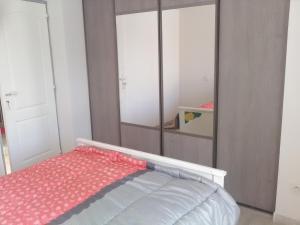 Postel nebo postele na pokoji v ubytování villa provençale STEVENSON