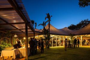 a group of people standing outside of a tent at Hotel Continental Ischia in Ischia +37 photos