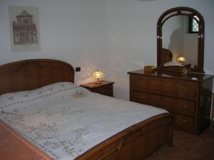 Posteľ alebo postele v izbe v ubytovaní Appartamento Tavernetta