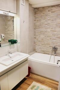 Kylpyhuone majoituspaikassa Foxxy Luxury Apartments