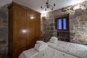 Cama o camas de una habitación en Alojamiento Rural URGAIN I y II