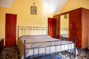 Een bed of bedden in een kamer bij Casa vacanze Ai Valàti CIR 19082-037C20-6280
