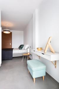 Posteľ alebo postele v izbe v ubytovaní Apartamentos Las Terrazas de Sotavento