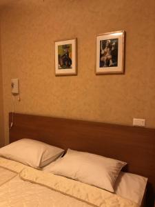 Кровать или кровати в номере Отель Галерея