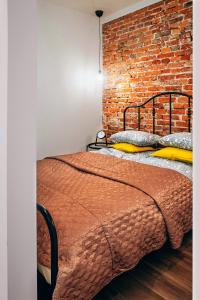 Posteľ alebo postele v izbe v ubytovaní Cosy Apartment