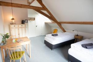 Ένα ή περισσότερα κρεβάτια σε δωμάτιο στο sport B&B De Veluwezoom