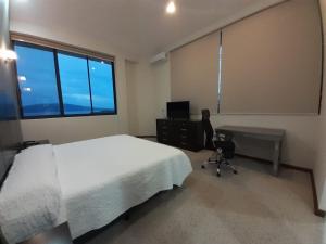 Postel nebo postele na pokoji v ubytování HOTEL CANDELERO + 17 fotografií