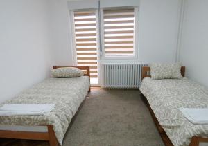 Postelja oz. postelje v sobi nastanitve Akvarius