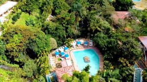 Vista de la piscina de Hotel Rio Perlas Spa & Resort o alrededores