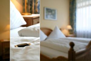 Ein Bett oder Betten in einem Zimmer der Unterkunft Hotel Bad Dürkheim