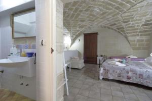 Postel nebo postele na pokoji v ubytování White Suite B&B