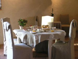 a table with a plate of food on it at Domaine de Bassilour in Bidart