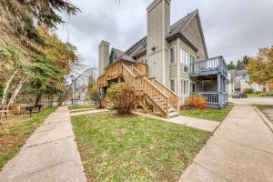 a large house with a staircase in front of it at Condo 704 at North Creek Resort in Blue Mountains