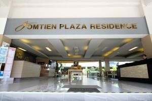 a sign for the entrance to a center plaza residence at Jomtien Plaza Residence in Jomtien Beach
