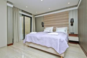 Postel nebo postele na pokoji v ubytování Apartments DEL MAR 1 + 27 fotografií