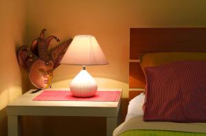 Uma cama ou camas num quarto em Lighthouse Apartments