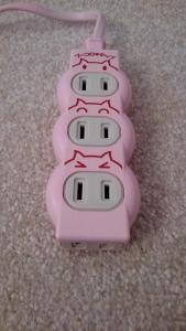 a pink wii remote control sitting on the floor at 女性用 Art Setouchi Triennale Hotel Female Only in Takamatsu