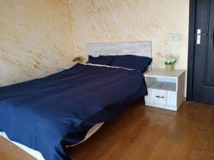 Voodi või voodid majutusasutuse Chase Dream Hostel追梦空间 toas