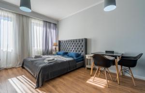Ένα ή περισσότερα κρεβάτια σε δωμάτιο στο Ski Apartment +53 φωτογραφίες