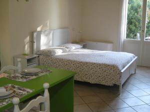 Posteľ alebo postele v izbe v ubytovaní Agriturismo Campagnoletto