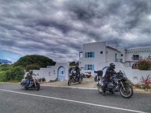 three motorcycles parked on the side of a road at Bellamente Sirene in Gansbaai
