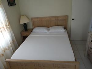Postel nebo postele na pokoji v ubytování Sue's Homestay