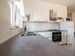 Kuchyň nebo kuchyňský kout v ubytování Apartment Antonio