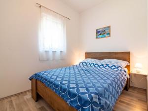 Postel nebo postele na pokoji v ubytování Apartment Antonio