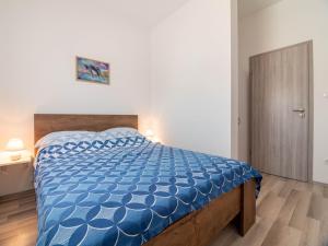 Postel nebo postele na pokoji v ubytování Apartment Antonio