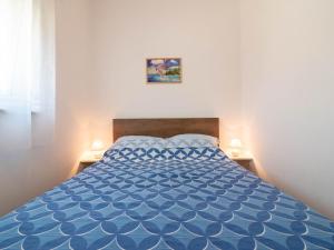 Postel nebo postele na pokoji v ubytování Apartment Antonio