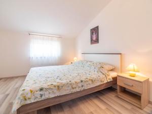 Postel nebo postele na pokoji v ubytování Apartment Antonio