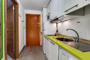 A kitchen or kitchenette at Apartment Studio Playa del Cura